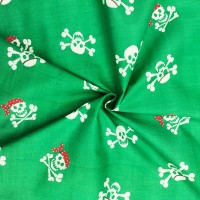 Halloween Polycotton Skulls on Green