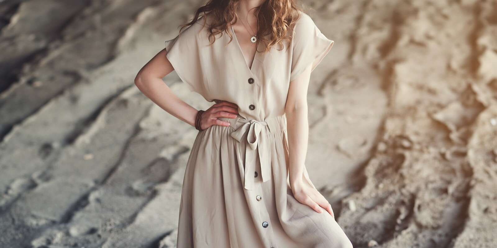 Woman in Beige Summer Dress on a sand dune