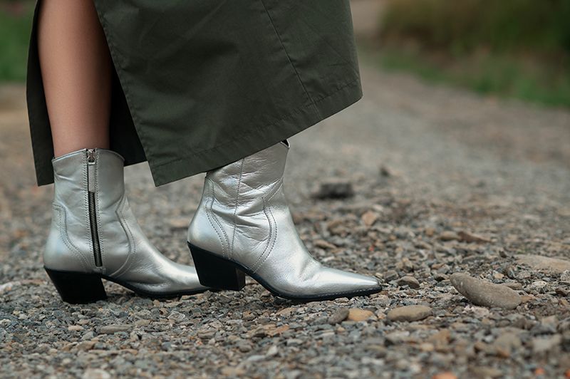 Woman in Silver Boots